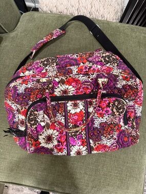 Vera Bradley quilted cotton travel bag in a colorful floral pattern